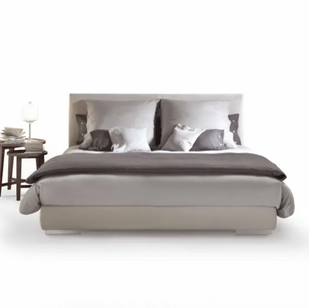 Letto con testiera in tessuto imbottito Magnum di Flexform