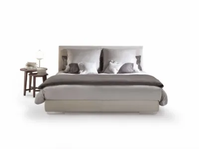 Letto con testiera in tessuto imbottito Magnum di Flexform