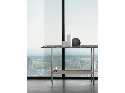 Mobile ingresso Waves con top in marmo Grigio carnico e base in metallo di Fiam