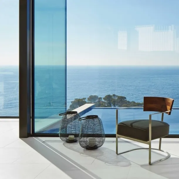 Poltroncina di design in legno massello e metallo con seduta in tessuto imbottito Morgan di Flexform