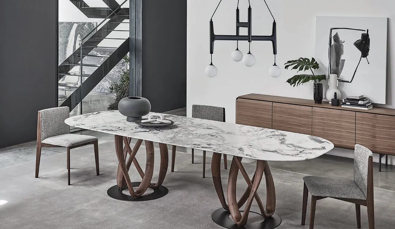 Tavolo ovale con piano in marmo e base in legno massello Infinity di Porada